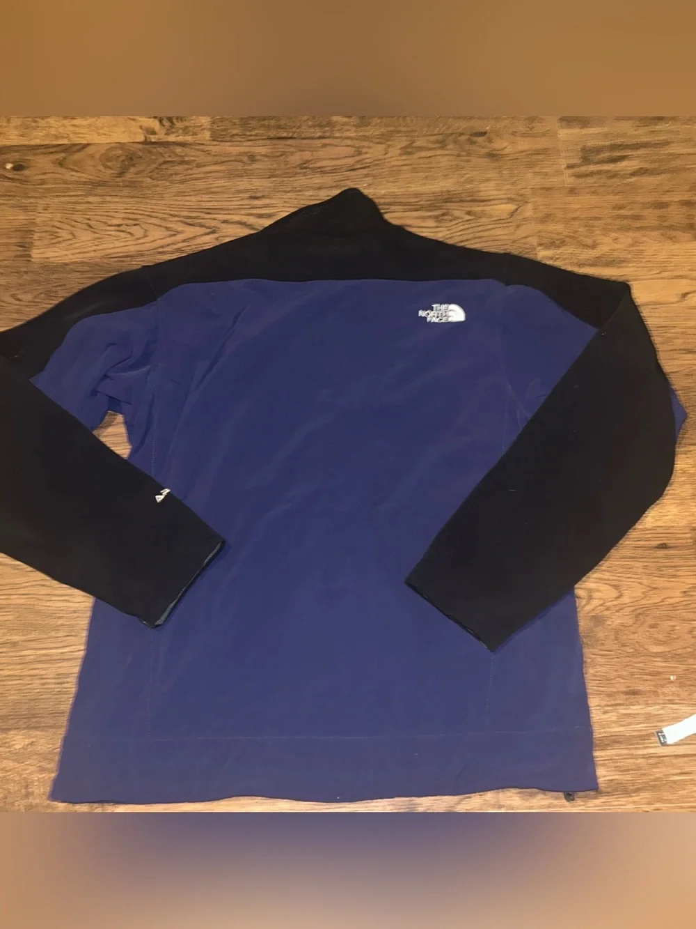 The North Face Men’s Blue and Black Softshell Jacket